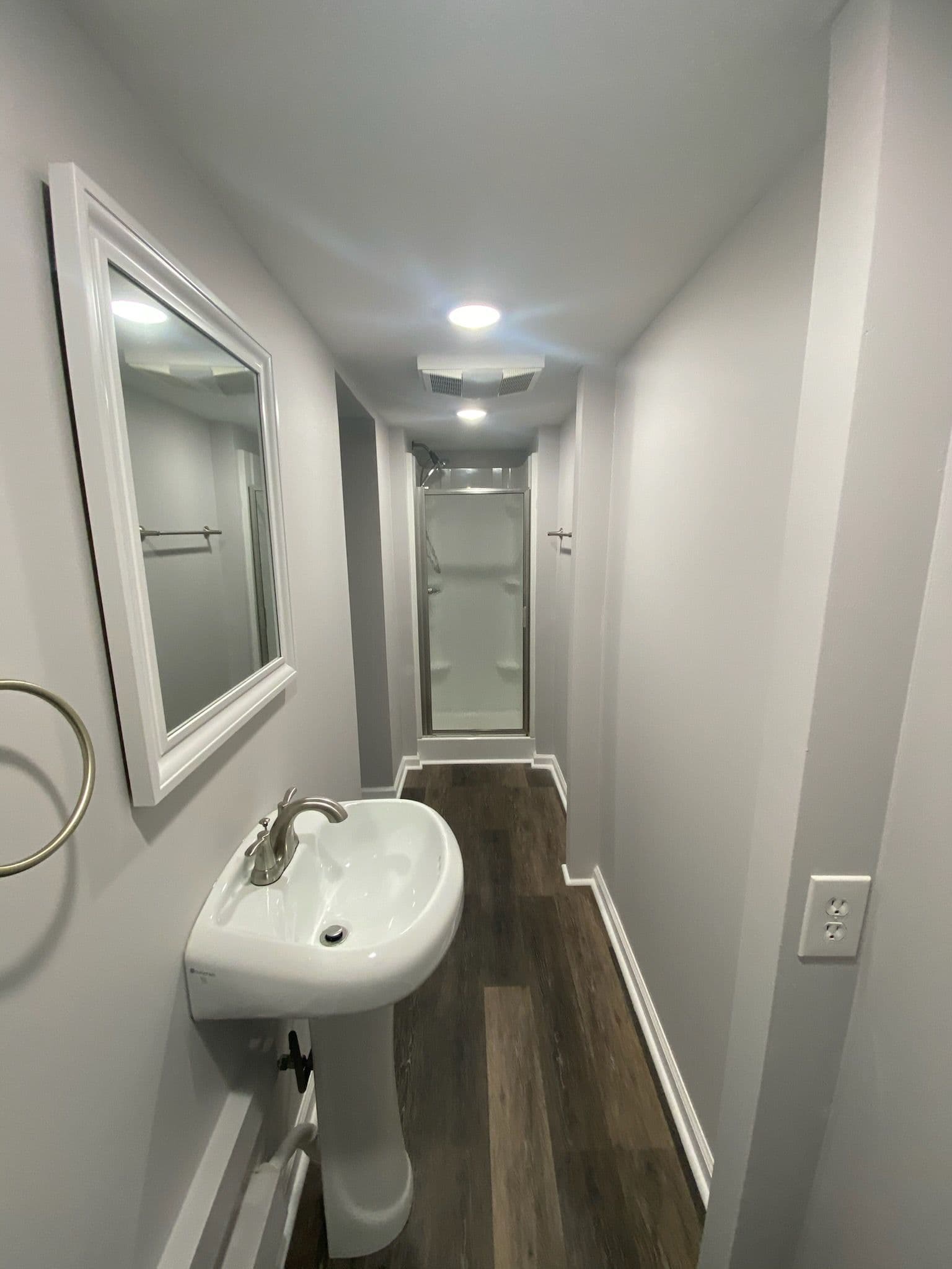 Basement Bathroom Transformation into a Modern Oasis image