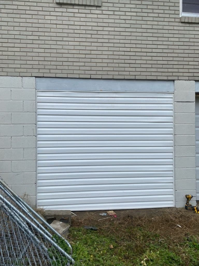 Project Sleek Garage Door Installation Enhances Home Exterior image
